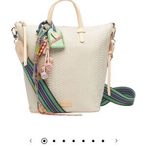 Consuela Thunderbird Sling. Cream Snake print